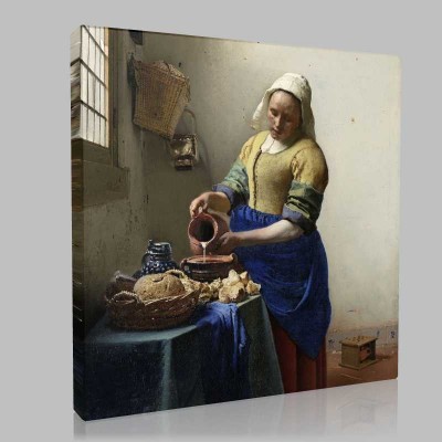 A Young Woman Pours Milk İnto A Cooking Kanvas Tablo
